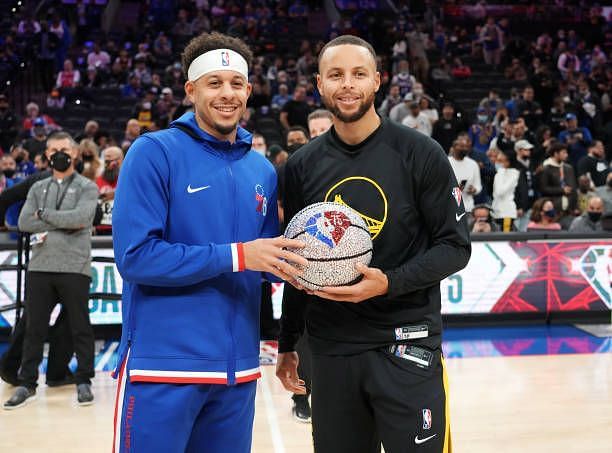 Seth Curry with Steph Curry