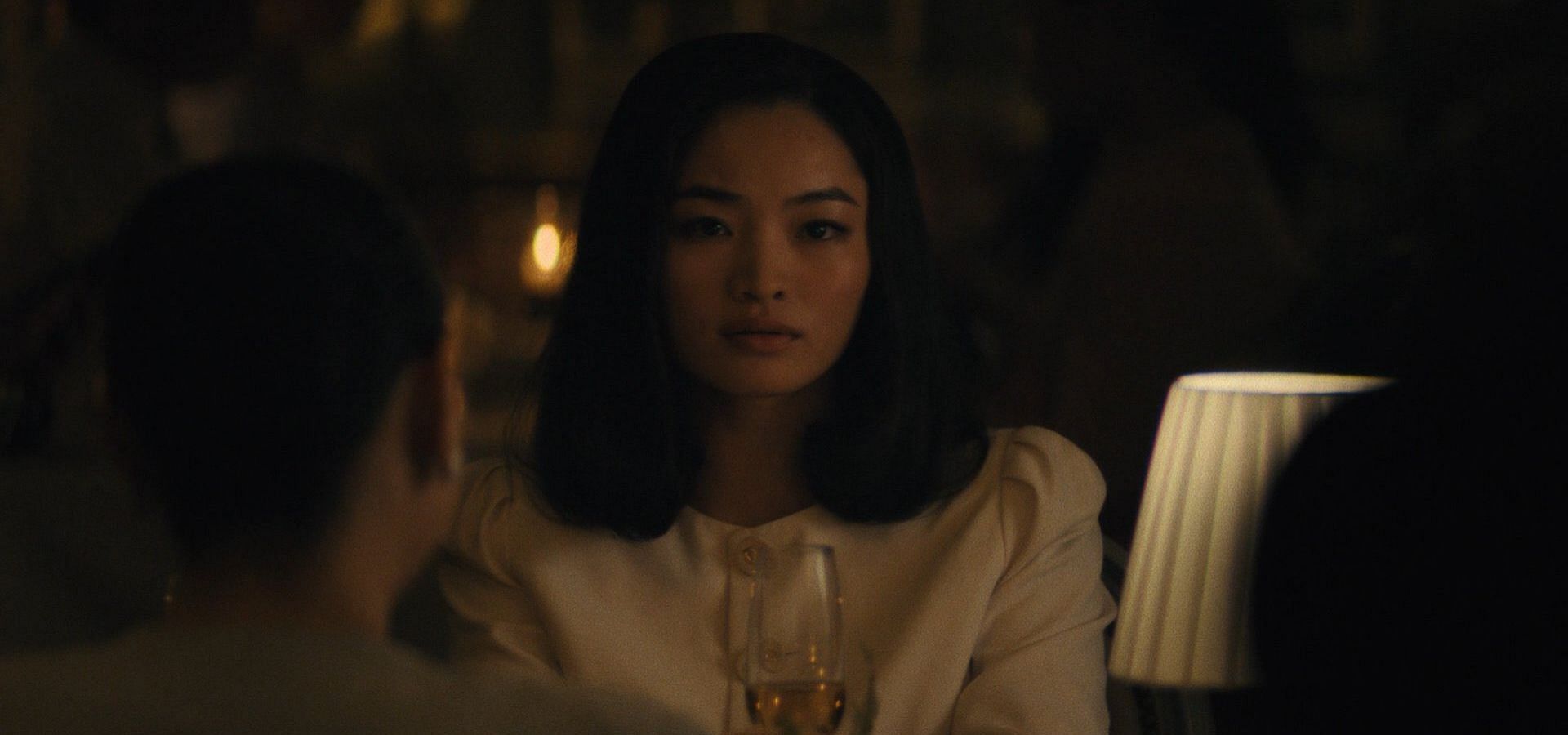 Solomon sees Naomi having dinner with another man and his family in Pachinko Season 2 episode 6. (Image via Apple TV+)