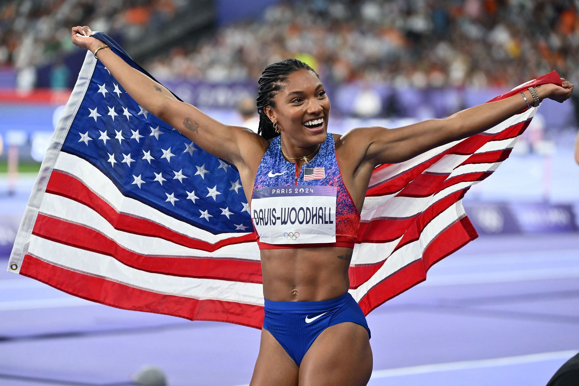 Tara Davis-Woodhall celebrates her win at the Paris Olympics. (Photo via Getty Images)