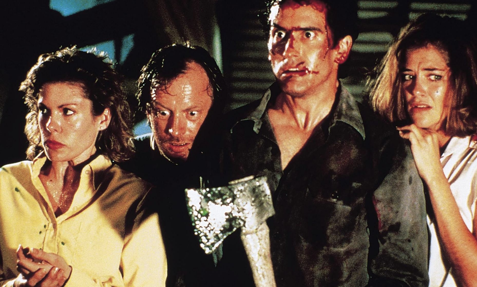 Sarah Berry, Bruce Campbell, Kassie Wesley DePaiva, and Dan Hicks in Evil Dead II (Image via Renaissance Pictures)