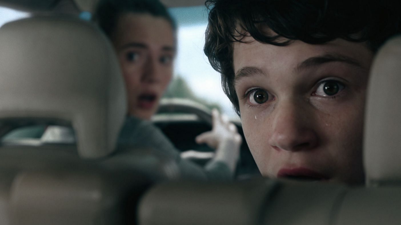 Caren Pistorius and Gabriel Bateman as seen in Unhinged (Image via Netflix)