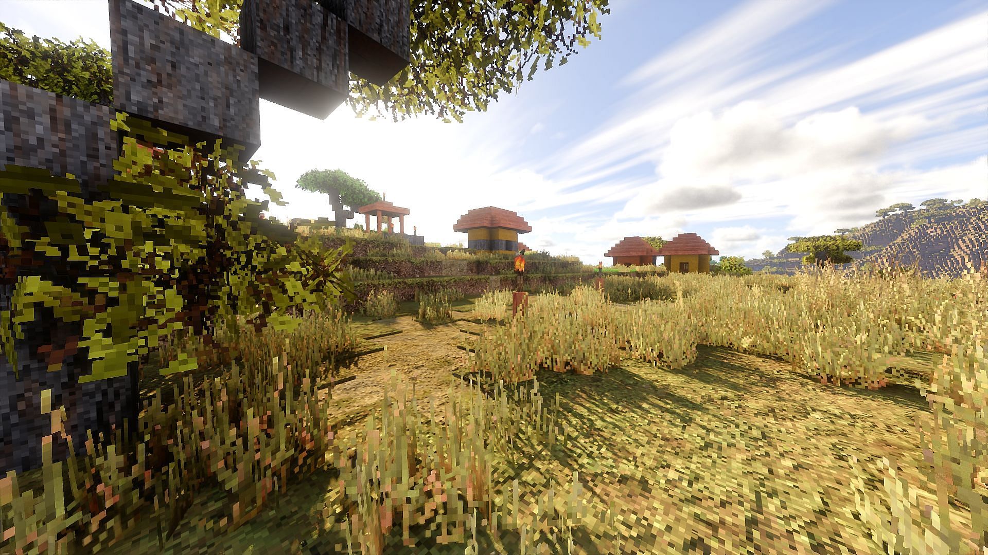 A savanna village using the Patrix resource pack and Noble shaders (Image via Mojang)