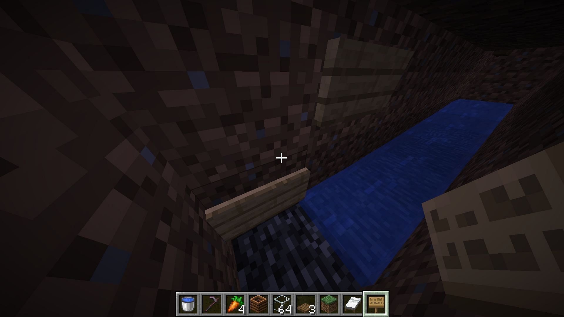 Place the oak signs and stop the flow of water (Image via Mojang Studios)