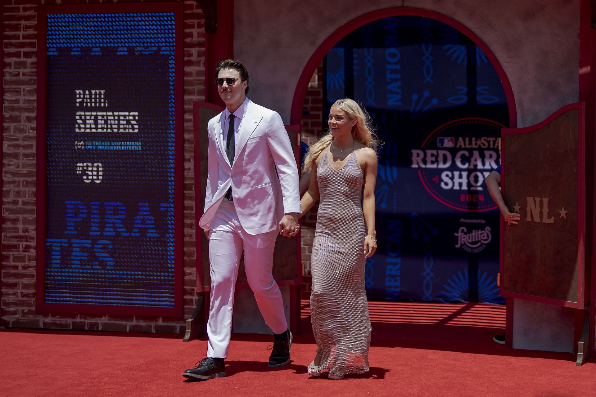 Olivia Dunne and Paul Skenes walking the red carpet at the All-Star Red Carpet Show presented by Frutitas Agua Fresca; (Source: Getty)