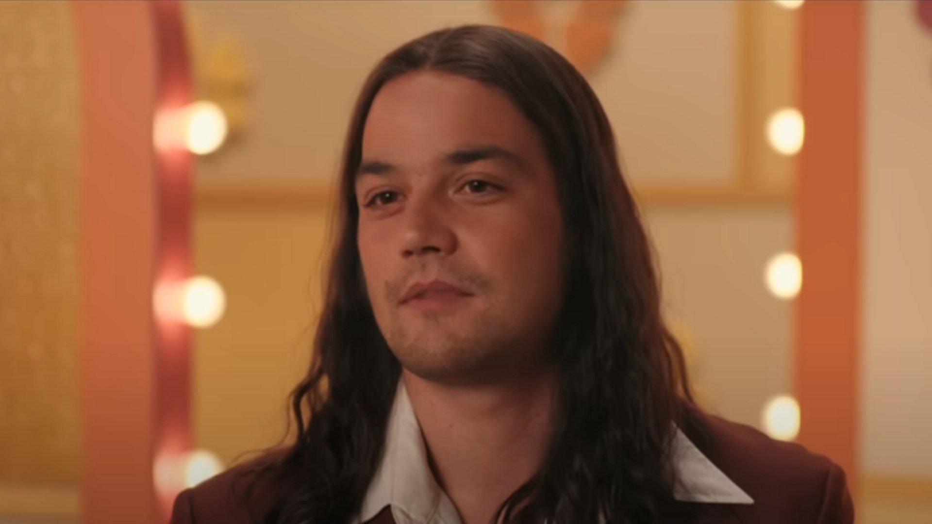 Daniel Zovatto seen as Rodney Alcala in the film (Image via Netflix)