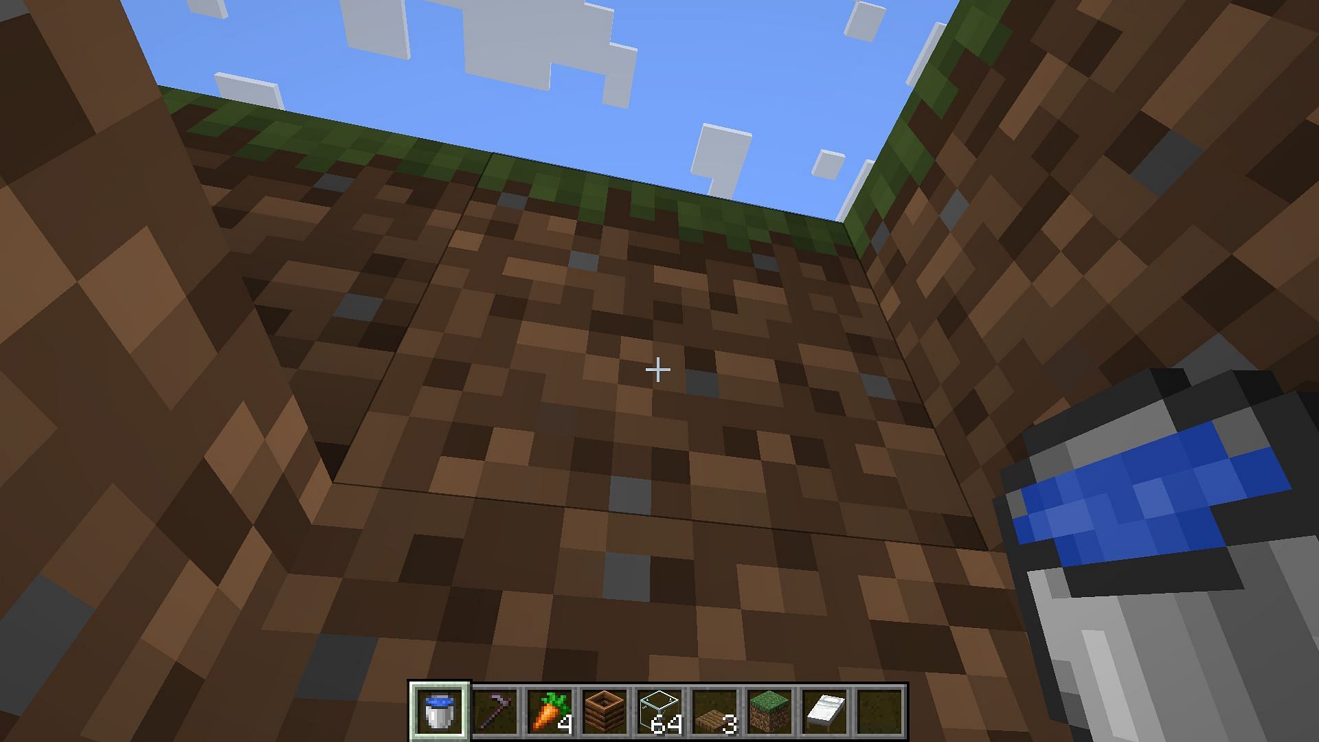 Place water to build the catchment area for the villager breeder in Minecraft 1.21 (Image via Mojang Studios)