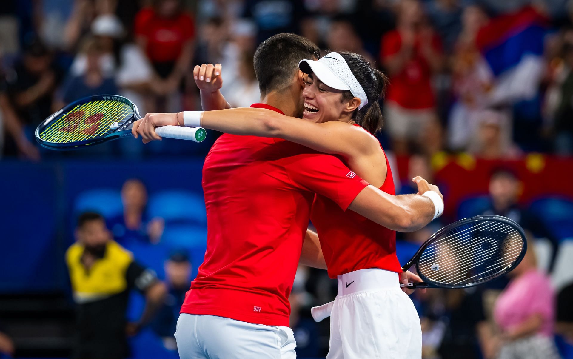 Novak Djokovic and Olga Danilovic hug each other at the 2024 United Cup | Image Source: Getty