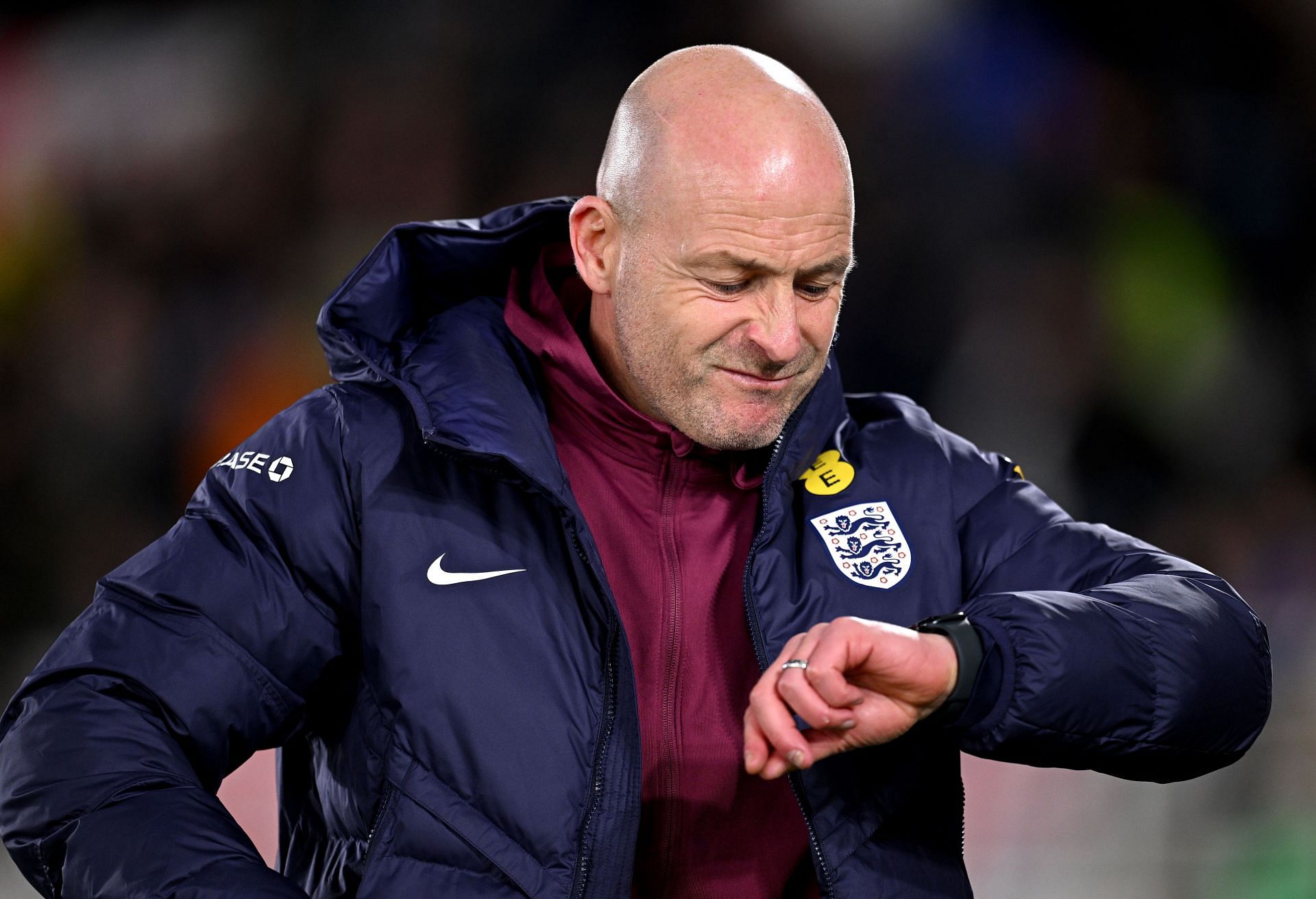 HELSINKI, FINLAND - OCTOBER 13: Lee Carsley, Interim Manager of England, checks his watch prior to the UEFA Nations League 2024/25 League B Group B2 match between Finland and England at Helsinki Olympic Stadium on October 13, 2024 in Helsinki, Finland. (Photo by Justin Setterfield/Getty Images) - Source: Getty