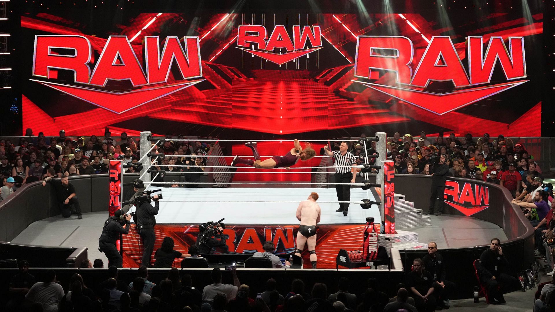 WWE Superstars in action on a live RAW