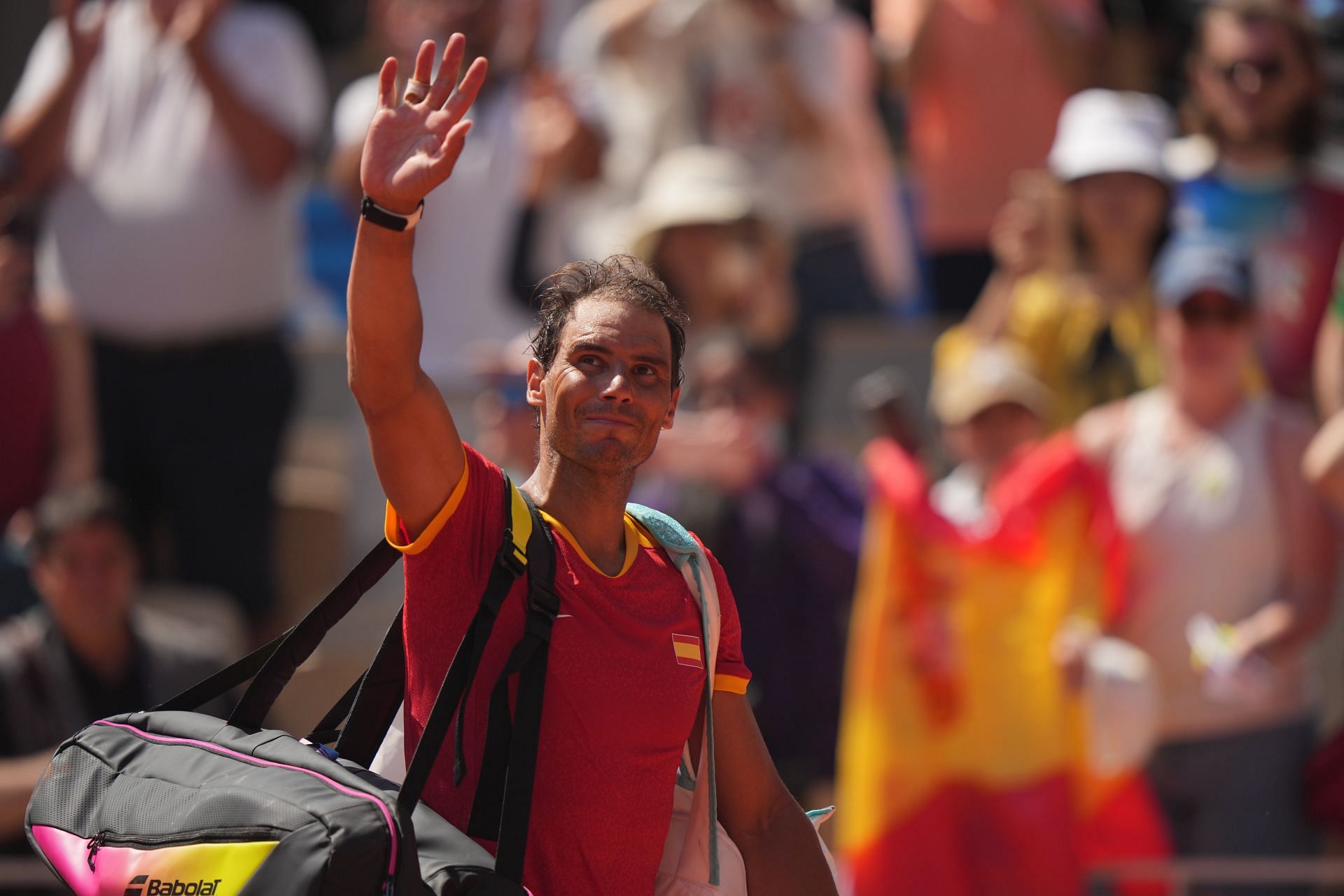 Rafael Nadal waves to Paris crowd during last appearance at Stade Roland Garros (Image via Getty)