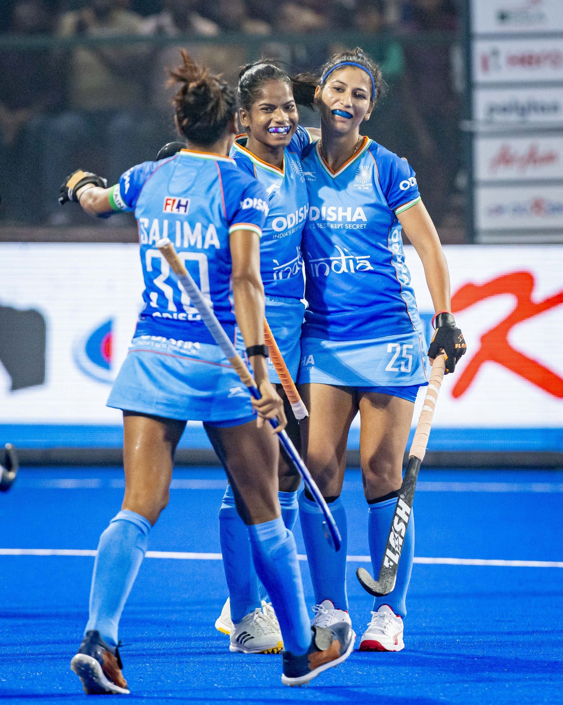 Sangita Kumari celebrates her goal with other Indian players