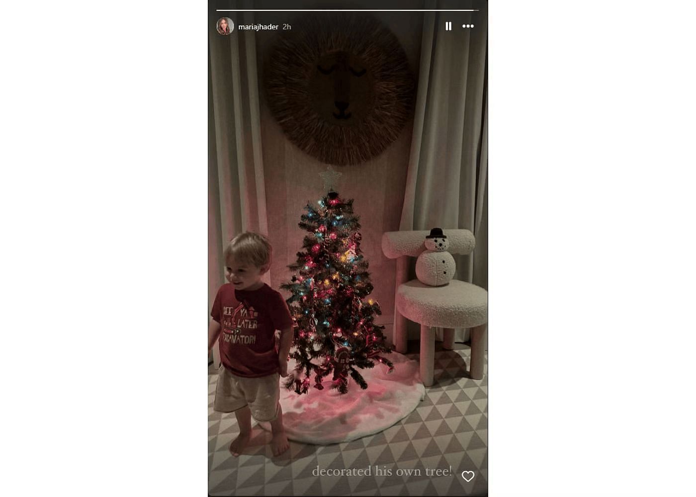 Maria Hader shares a photo of son Lucas next to a small Christmas tree (credit: mariajhader/Instagram)