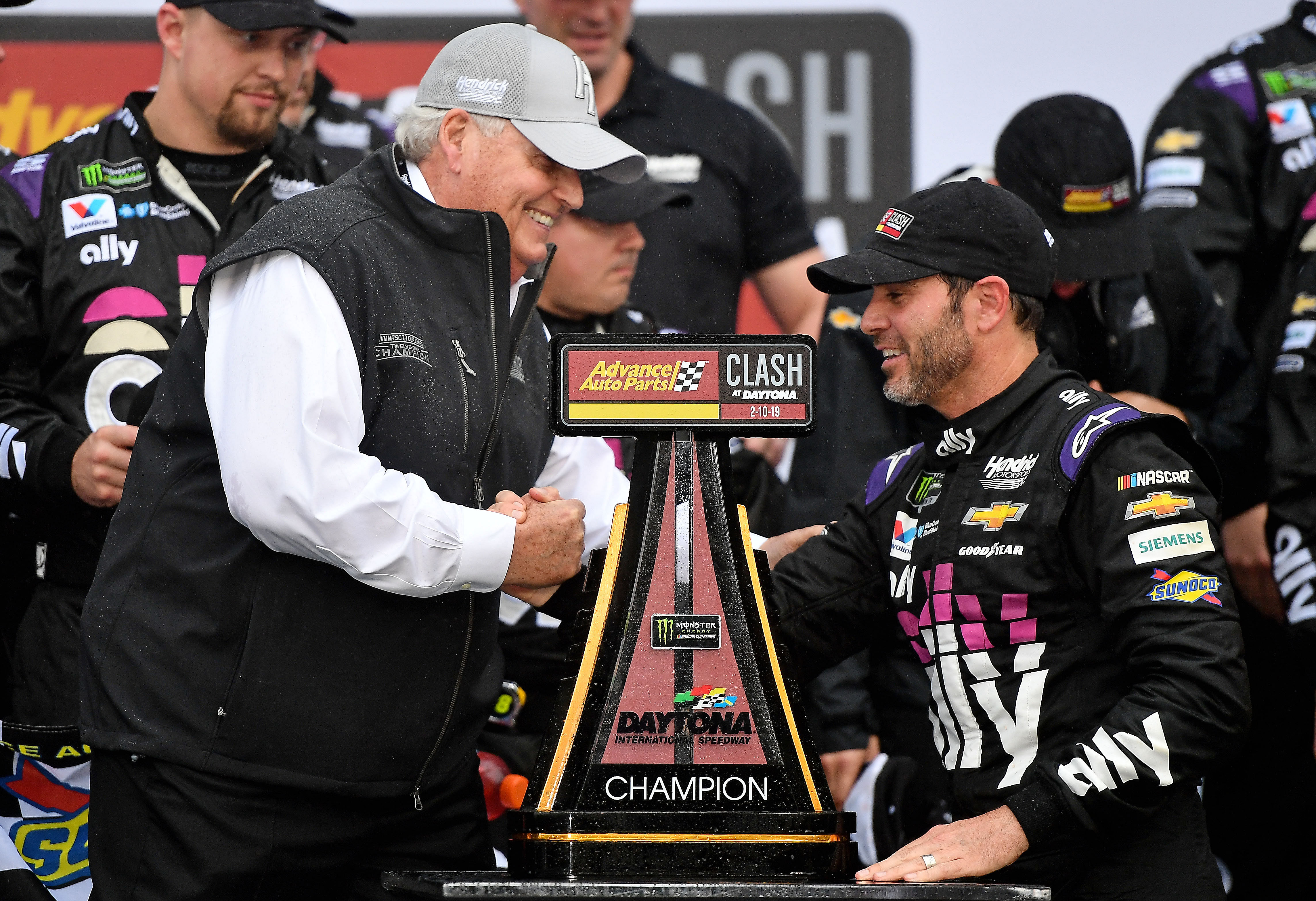 NASCAR Cup Series driver Jimmie Johnson (R) celebrates with team owner Rick Hendrick (L) of Hendrick Motorsports after winning the Advance Auto Parts Clash at Daytona International Speedway. Mandatory Credit: Jasen Vinlove-Imagn Images