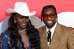 Noah Lyles and fiancée Junelle Bromfield grace the red carpet of the GQ Men of the Year 2024