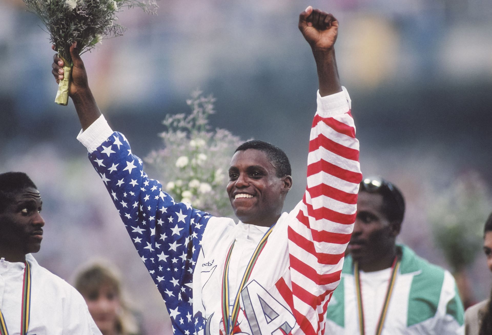 Carl Lewis after winning the 4x100m relay team gold at the 1992 Summer Olympics (Image via: Getty Images)