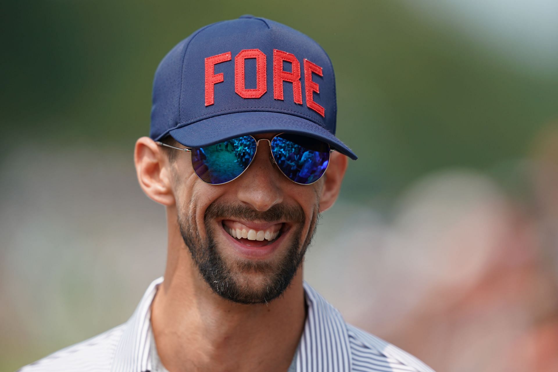 Michael Phelps on the first tee during the final round of the 100th PGA Championship held at Bellerive Golf Club in St. Louis, Missouri. (Photo via Getty Images)