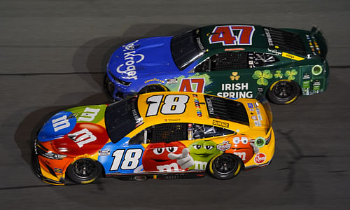 Kyle Busch (18) and driver Ricky Stenhouse Jr. (47) race side by side during the Bluegreen Vacations Duel 2 at Daytona International Speedway. Mandatory Credit: Mike Dinovo-Imagn Image