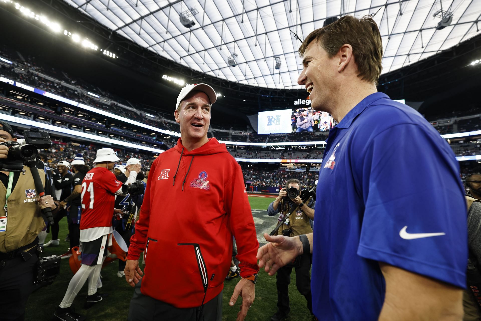 Peyton Manning left and Eli Manning, right, during the 2023 NFL Pro Bowl Games - Source: Getty