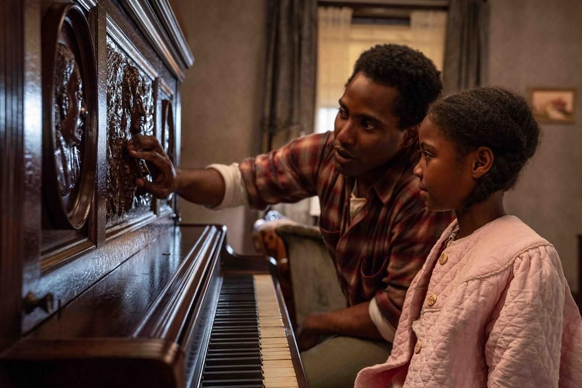 John David Washington as Boy Willie and Skylar Aleece Smith as Maretha in The Piano Lesson (Image via Netflix)