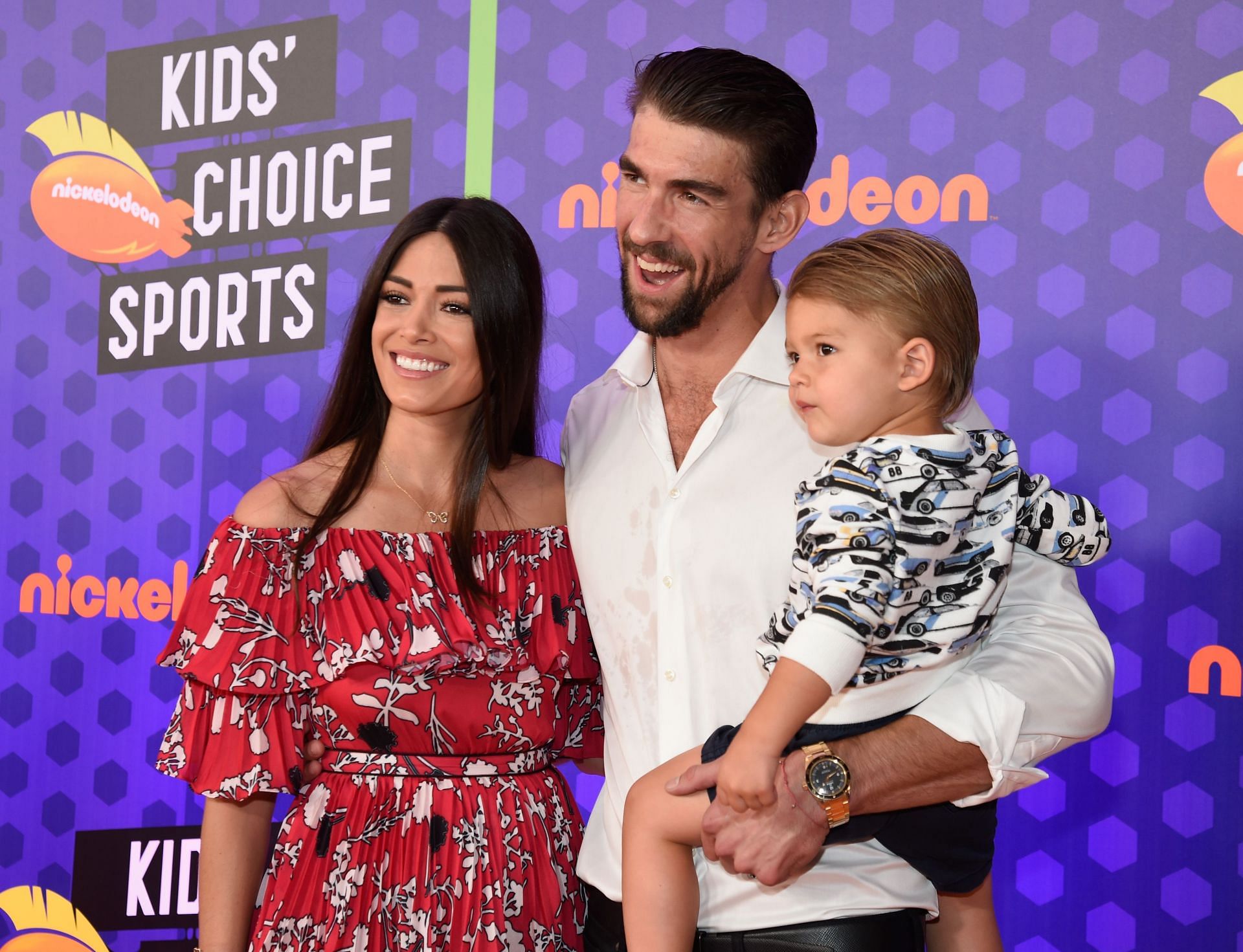 Michael Phelps and Nicole Johnson at Nickelodeon Kids&#039; Choice Sports 2018 - Red Carpet - Source: Getty