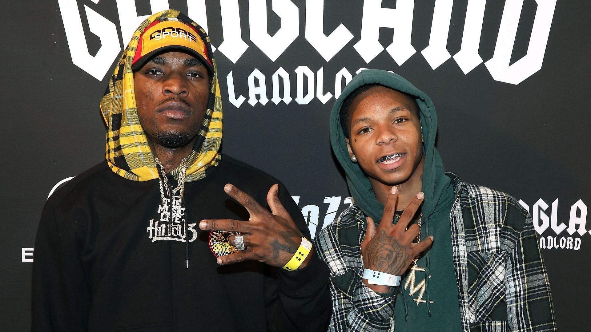 Hitta J3 (L) and Mycrazy Ro (R) attend Mozzy's "Gangland Landlord" Album Listening Experience at E.P. & L.P. on September 25, 2018, in West Hollywood, California. (Image via Getty/Jerritt Clark)