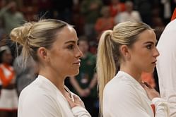 WATCH: Miami's Haley and Hanna Cavinder show off their body strength in latest TikTok post Charlotte victory