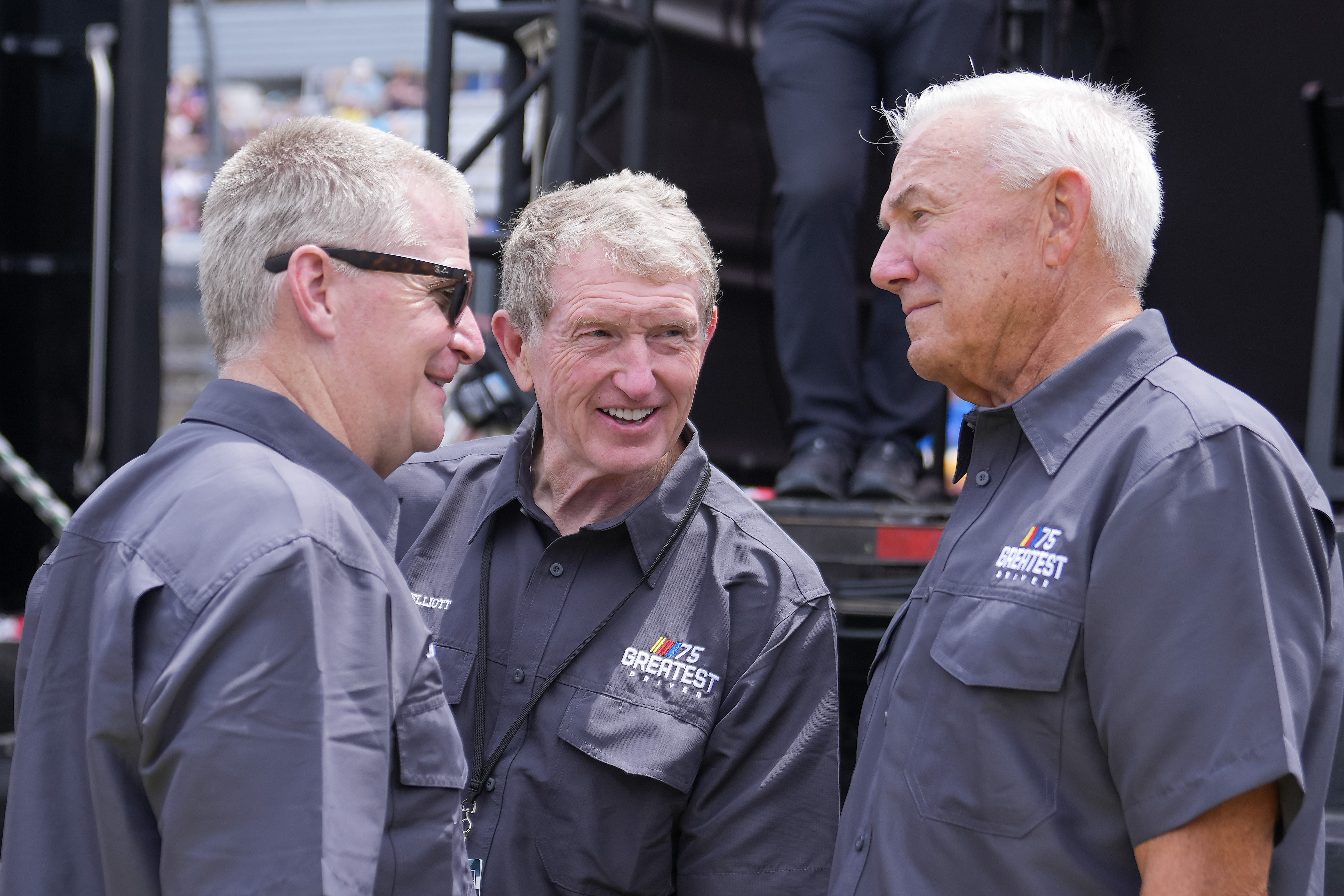 Bill Elliott (center) talks with Jeff Burton (left) and Dale Jarrett pre-race at Darlington Raceway. Mandatory Credit: David Yeazell-Imagn Images