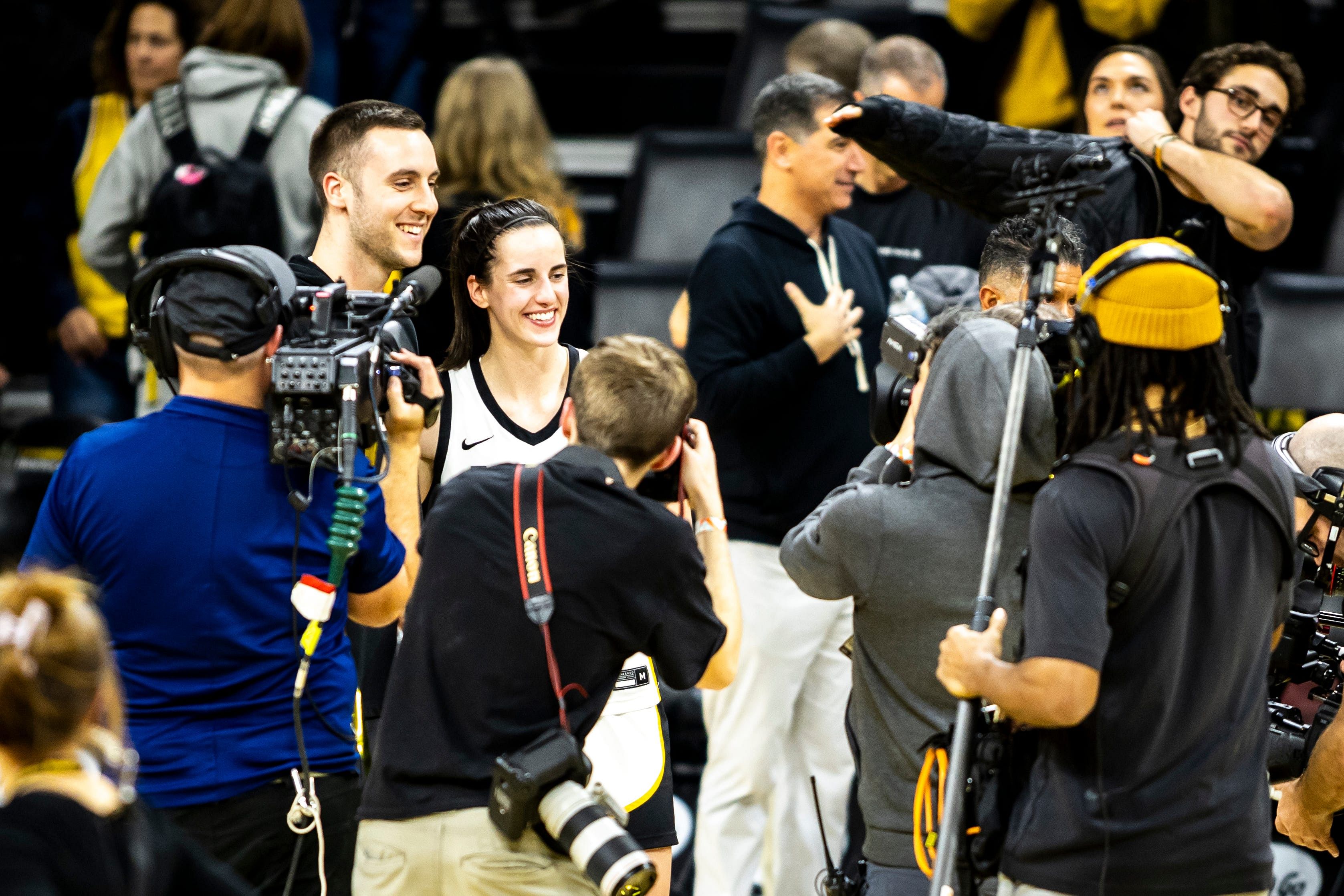 Caitlin Clark poses for a photo with Connor McCaffery after an NCAA Big Ten Conference women&#039;s basketball game against Michigan in Iowa City, Iowa. Source: Imagn