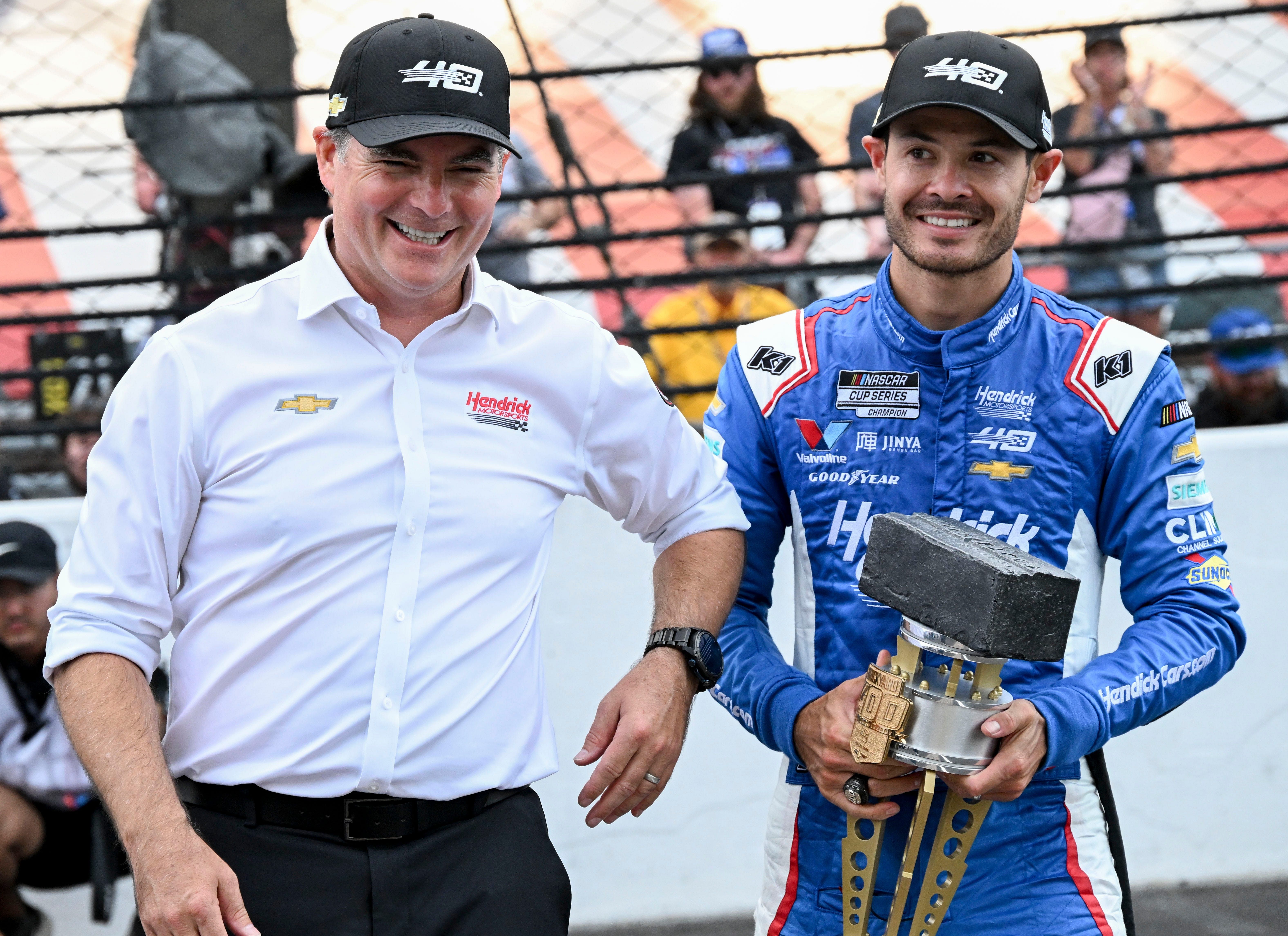 Jeff Gordon celebrates with NASCAR Cup Series driver Kyle Larson (5) after he won the Brickyard 400, Sunday, July 21, 2024, at Indianapolis Motor Speedway (Photo via Imagn)