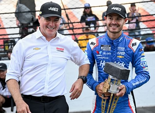 Jeff Gordon celebrates with NASCAR Cup Series driver Kyle Larson (5) after he won the Brickyard 400, Sunday, July 21, 2024, at Indianapolis Motor Speedway (Photo via Imagn)