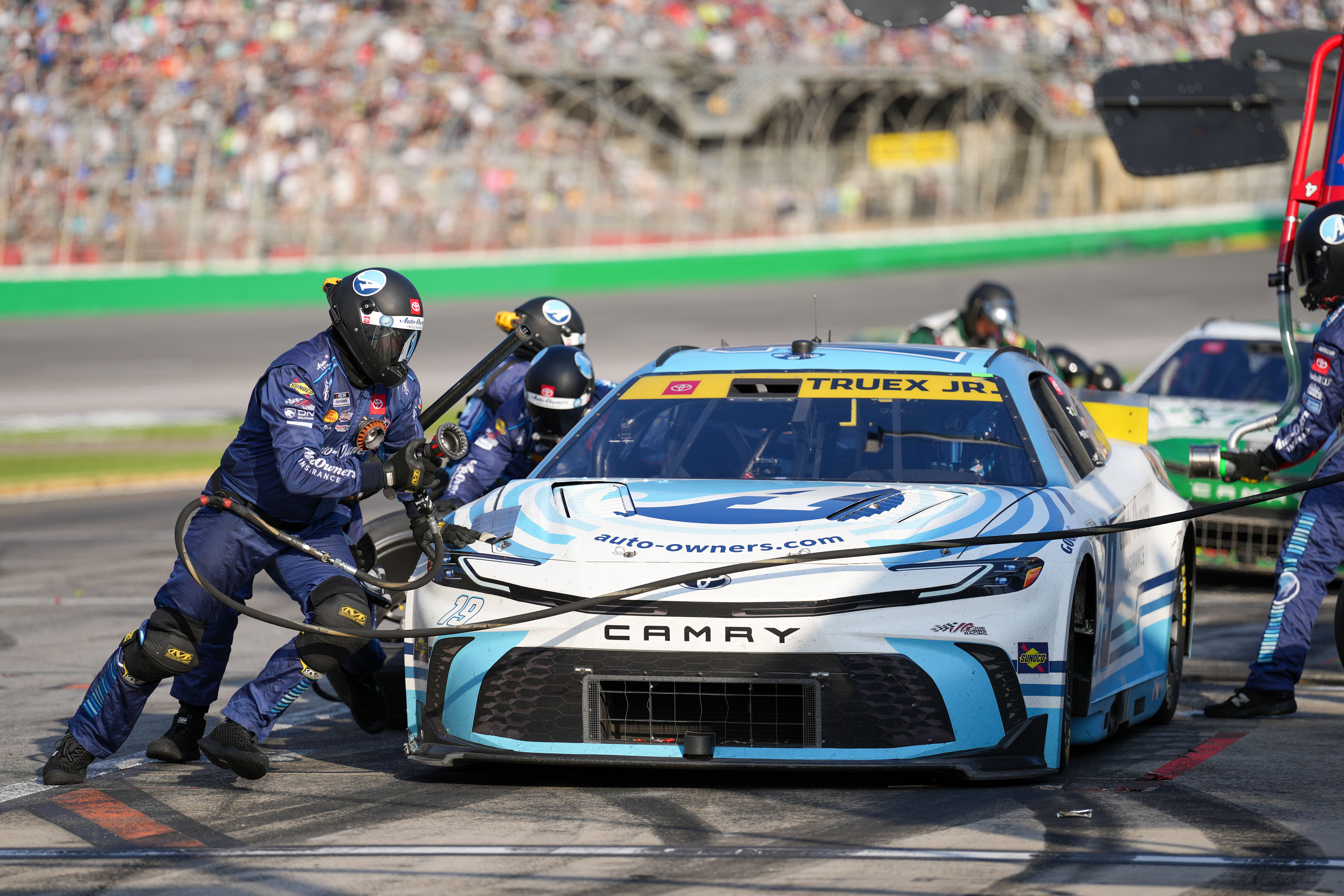 Joe Gibbs Racing driver Martin Truex Jr. making a pit stop for new tires - Source: Imagn