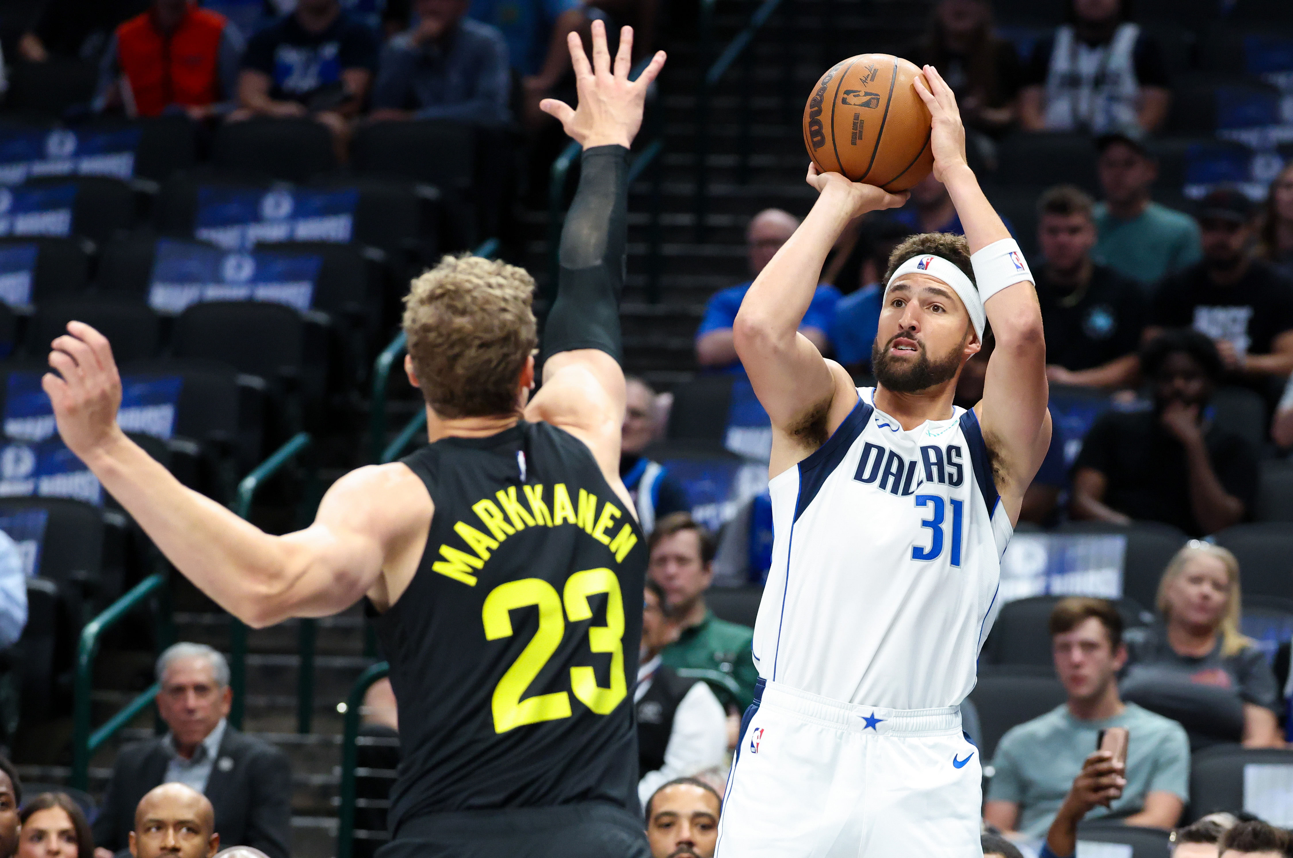 Dallas Mavericks guard Klay Thompson shoots over Utah Jazz forward Lauri Markkanen at American Airlines Center. Photo Credit: Imagn