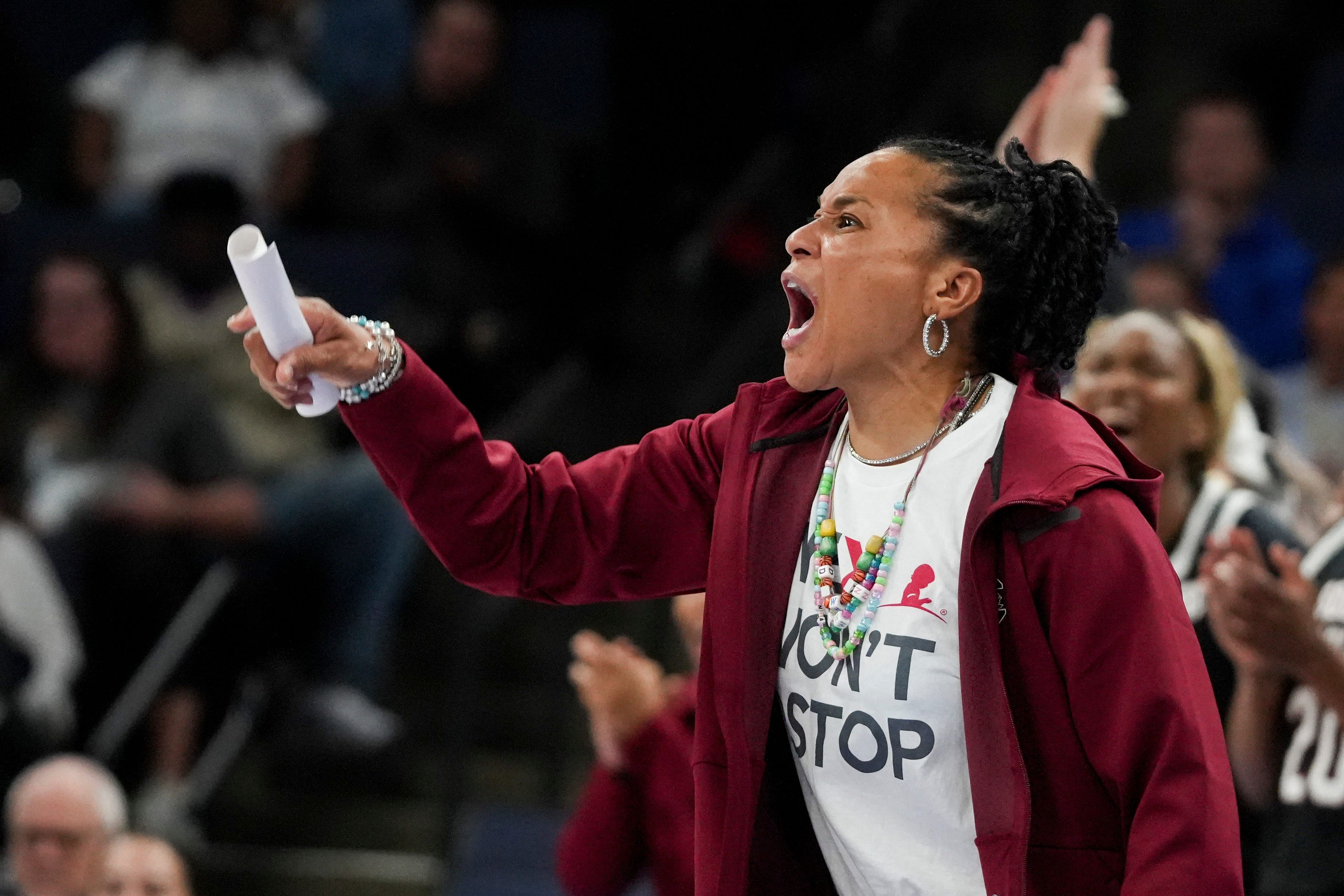 Dawn Staley and the South Carolina Gamecocks survived the Michigan Wolverines in their season opener.