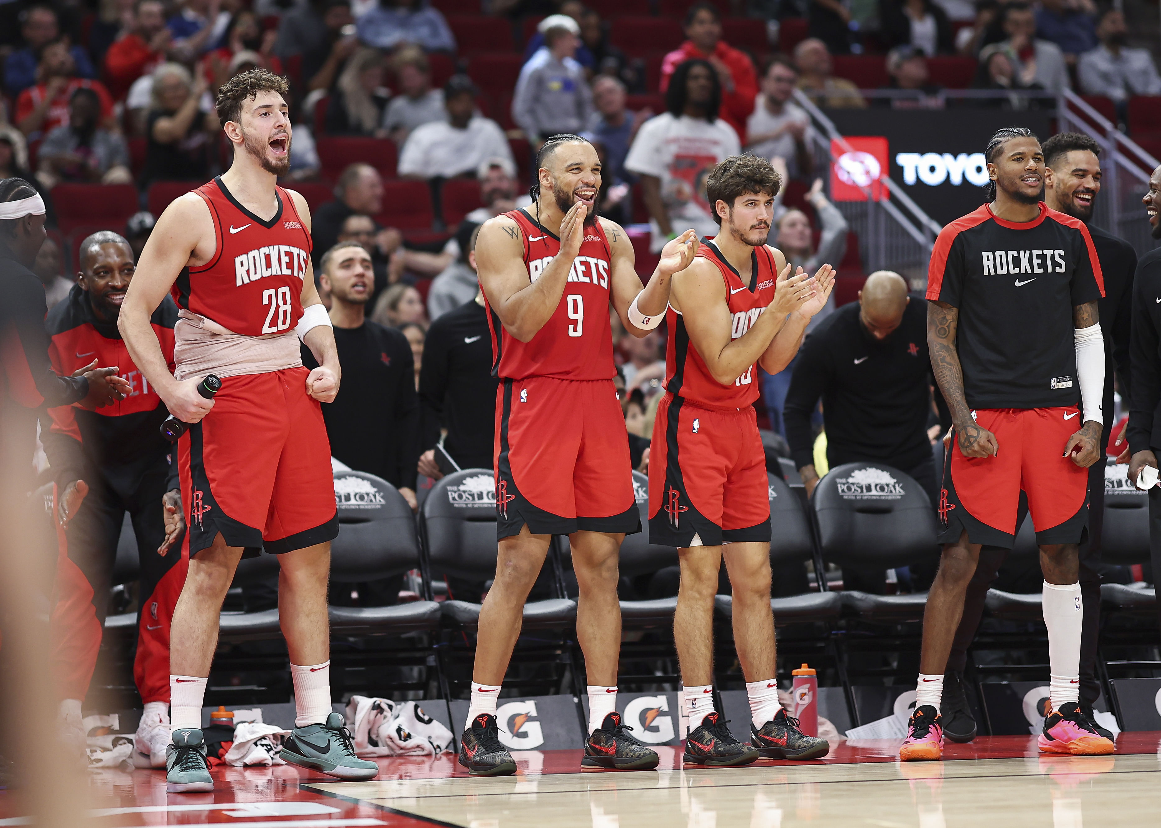 Houston Rockets' Alperen Sengun, Dillon Brooks, Reed Sheppard and Jalen Green react from the bench after a play against the Memphis Grizzlies at Toyota Center. (Credits: IMAGN)