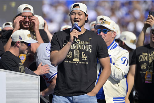 Shohei Ohtani drank at the parade (Imagn)