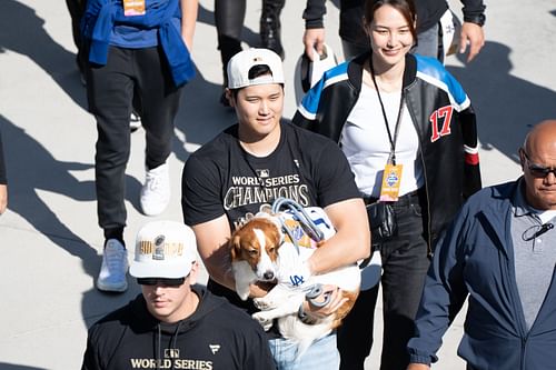 Shohei Ohtani and his dog Decoy (Imagn)