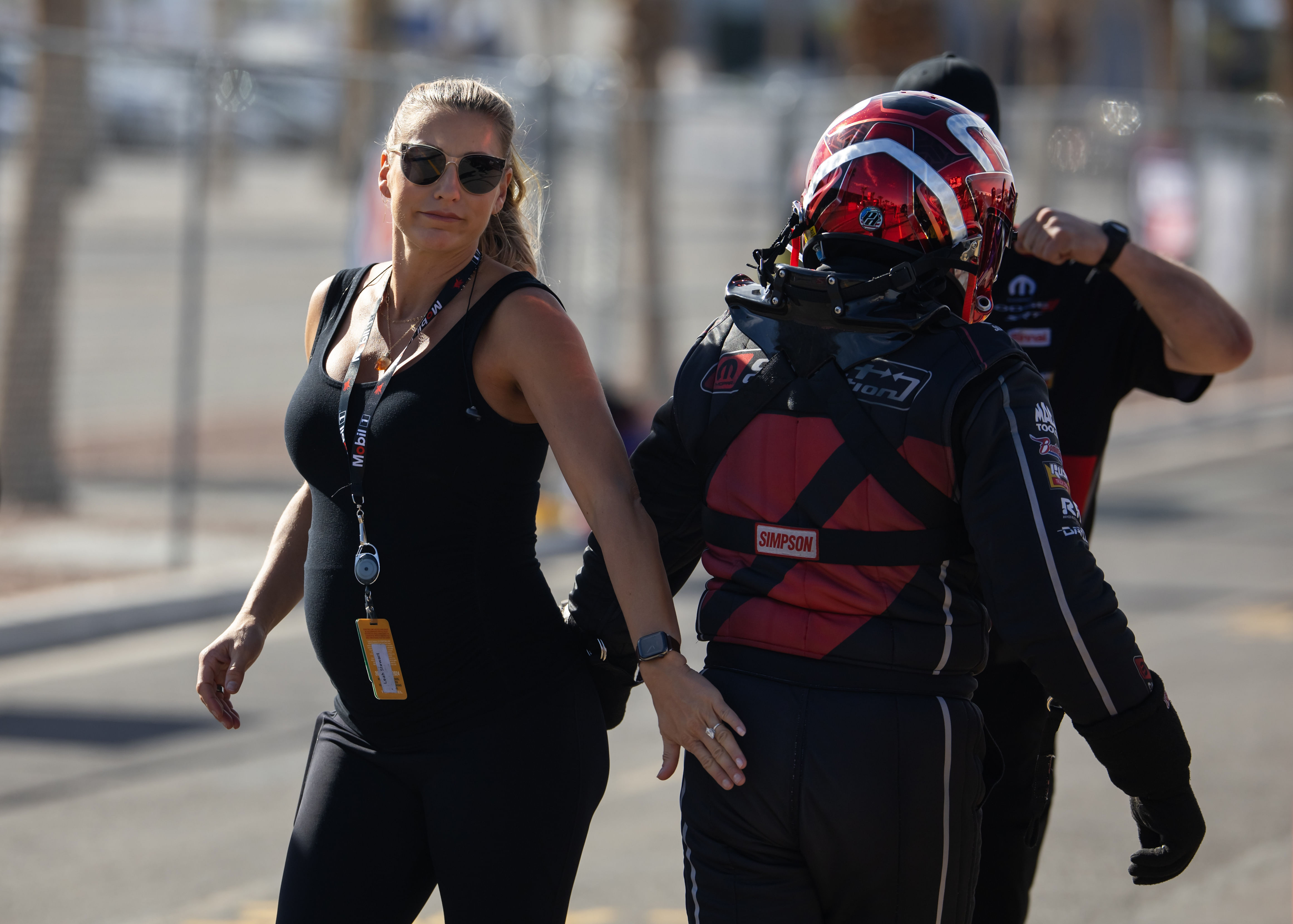 Nov 1, 2024; NHRA pregnant top fuel driver Pruett with husband Stewart during qualifying for the Ford Performance Nationals at The Strip at Las Vegas Motor Speedway | Imagn