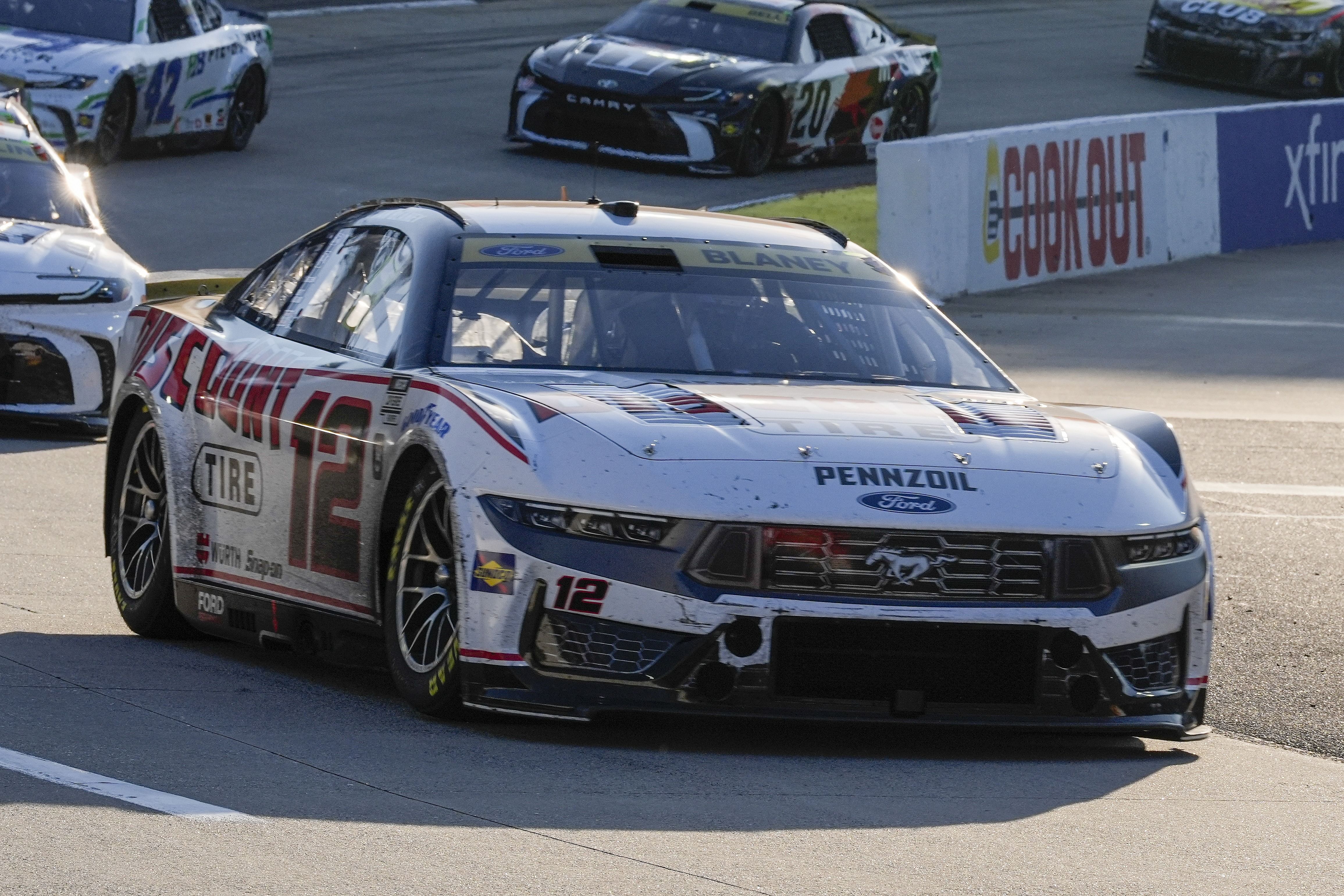 NASCAR Cup Series driver Ryan Blaney (12) and the field out of turn two during the Xfinity 500 at Martinsville Speedway (Image via Imagn)