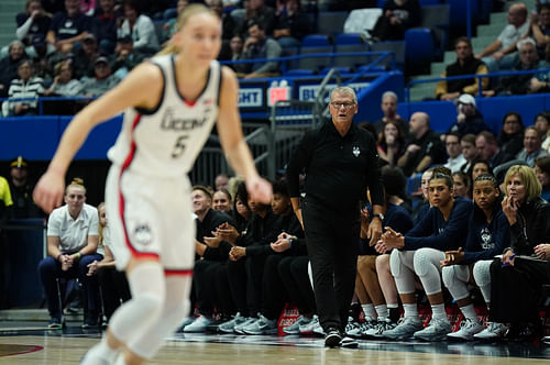 Geno Auriemma watching Paige Bueckers from the sideline. (Image Credits: David Butler II, Imagn)