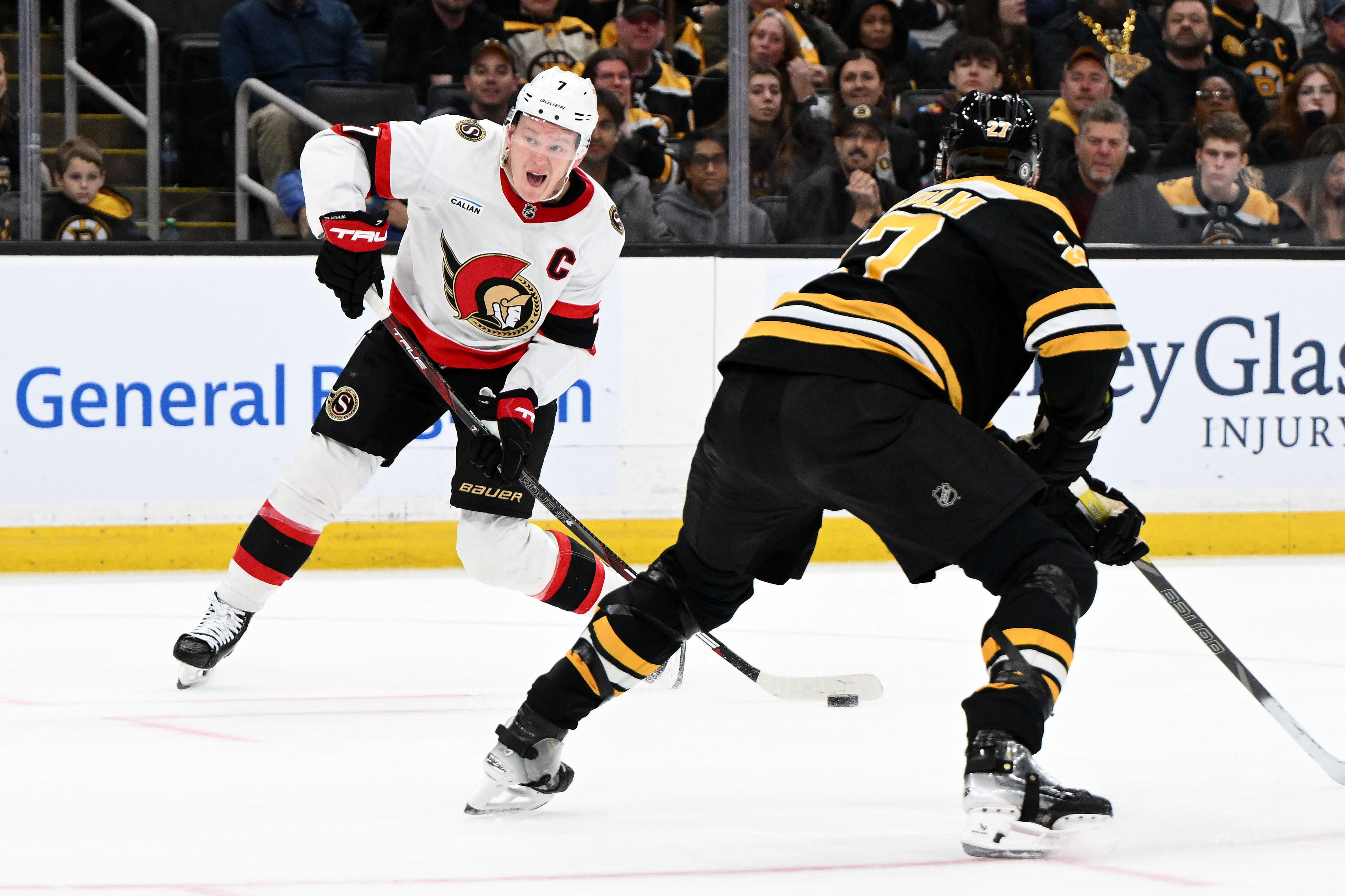 Ottawa Senators left wing Brady Tkachuk (7) shoots the game-winning overtime goal against the Boston Bruins (Credits: IMAGN)