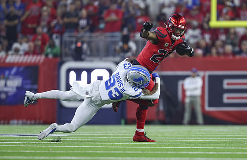 Houston Texans RB Joe Mixon (28) is tackled by Detroit Lions CB Carlton Davis III (Credits: IMAGN)