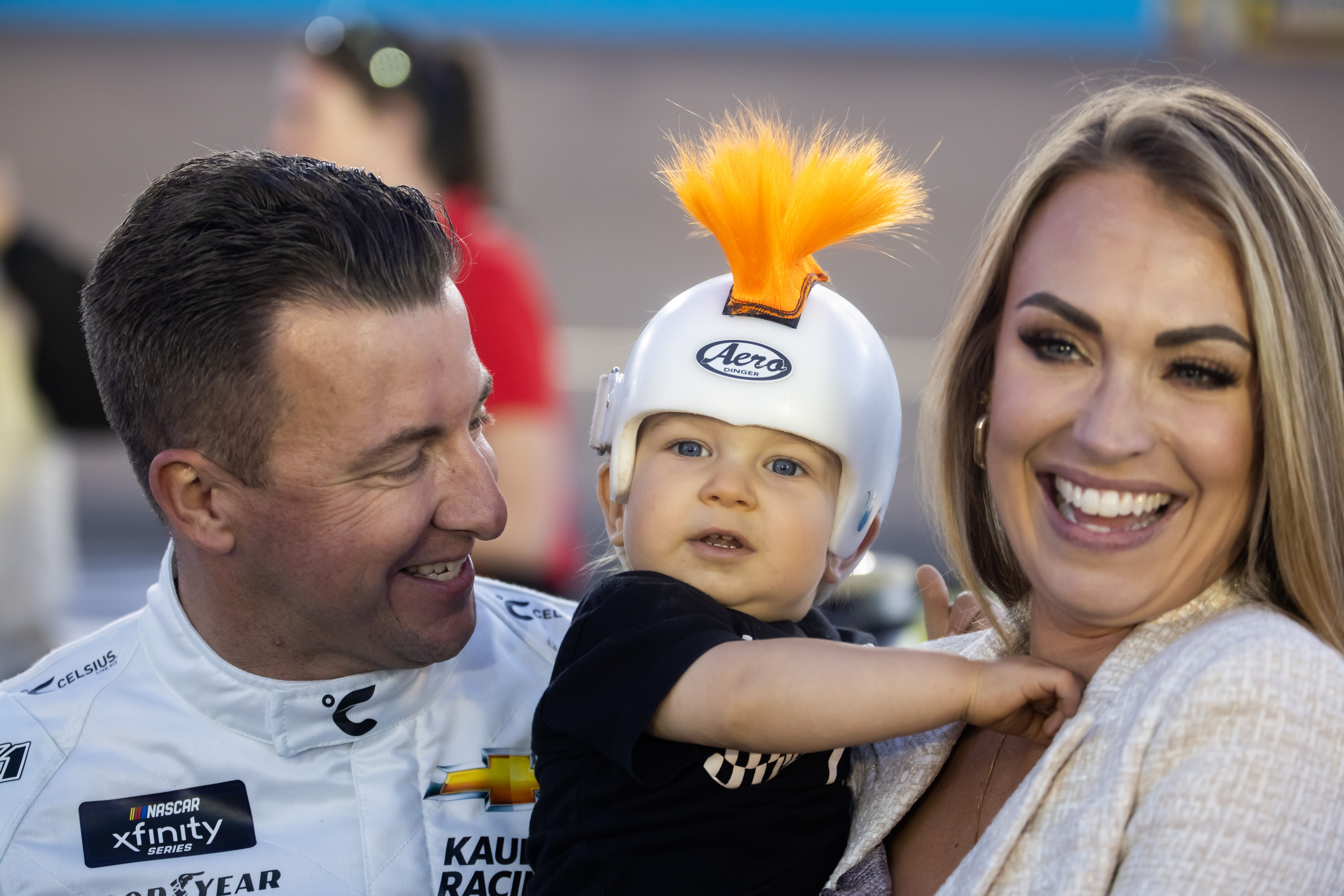 AJ Allmendinger with wife Tara Allmendinger and son Aero Allmendinger during the Championship race at Phoenix Raceway. Mandatory Credit: Mark J. Rebilas-Imagn Images