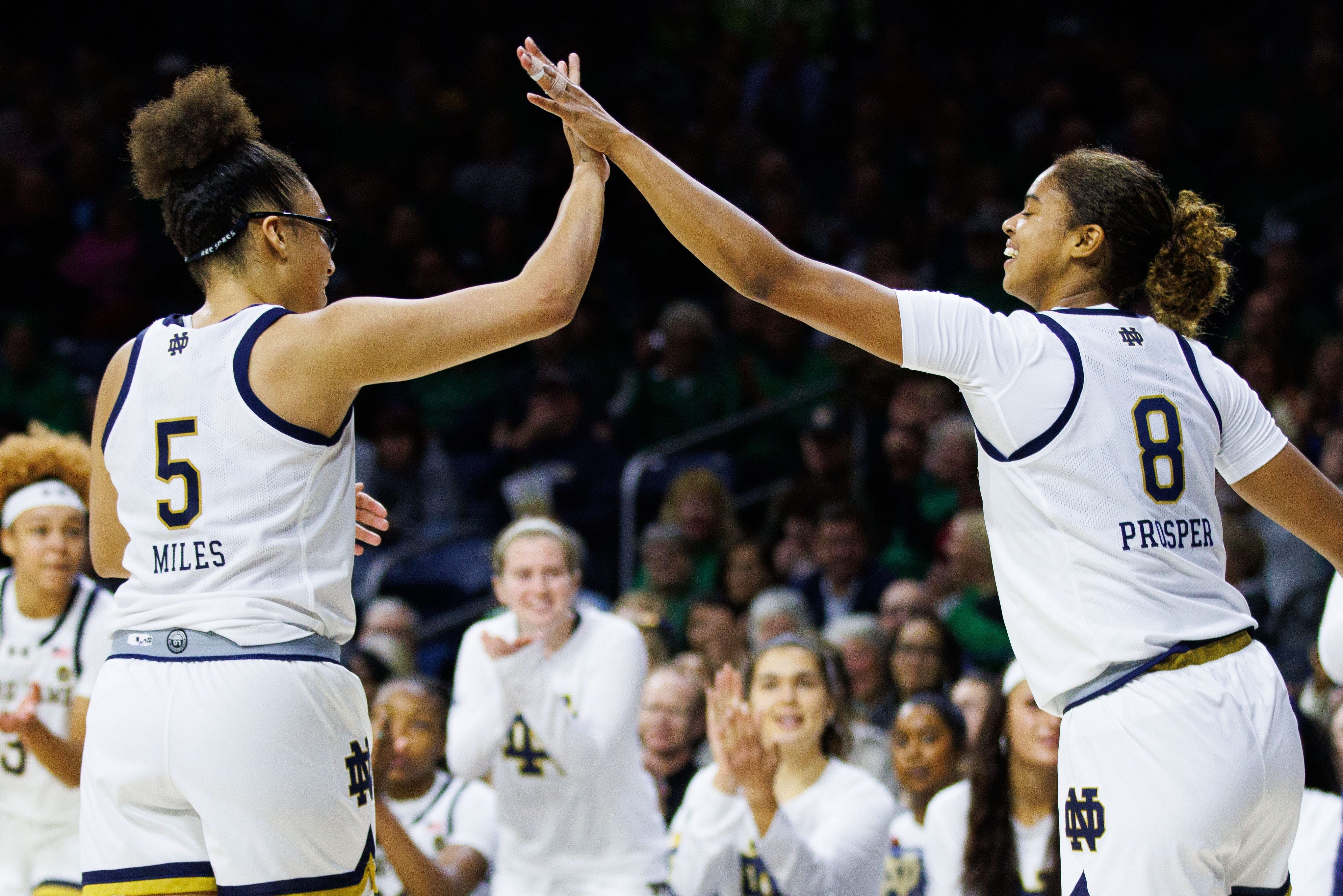 Notre Dame&#039;s Olivia Miles (5) and Cassandre Prosper (8) celebrate a play during the game against James Madison at Purcell Pavilion. Photo: Imagn