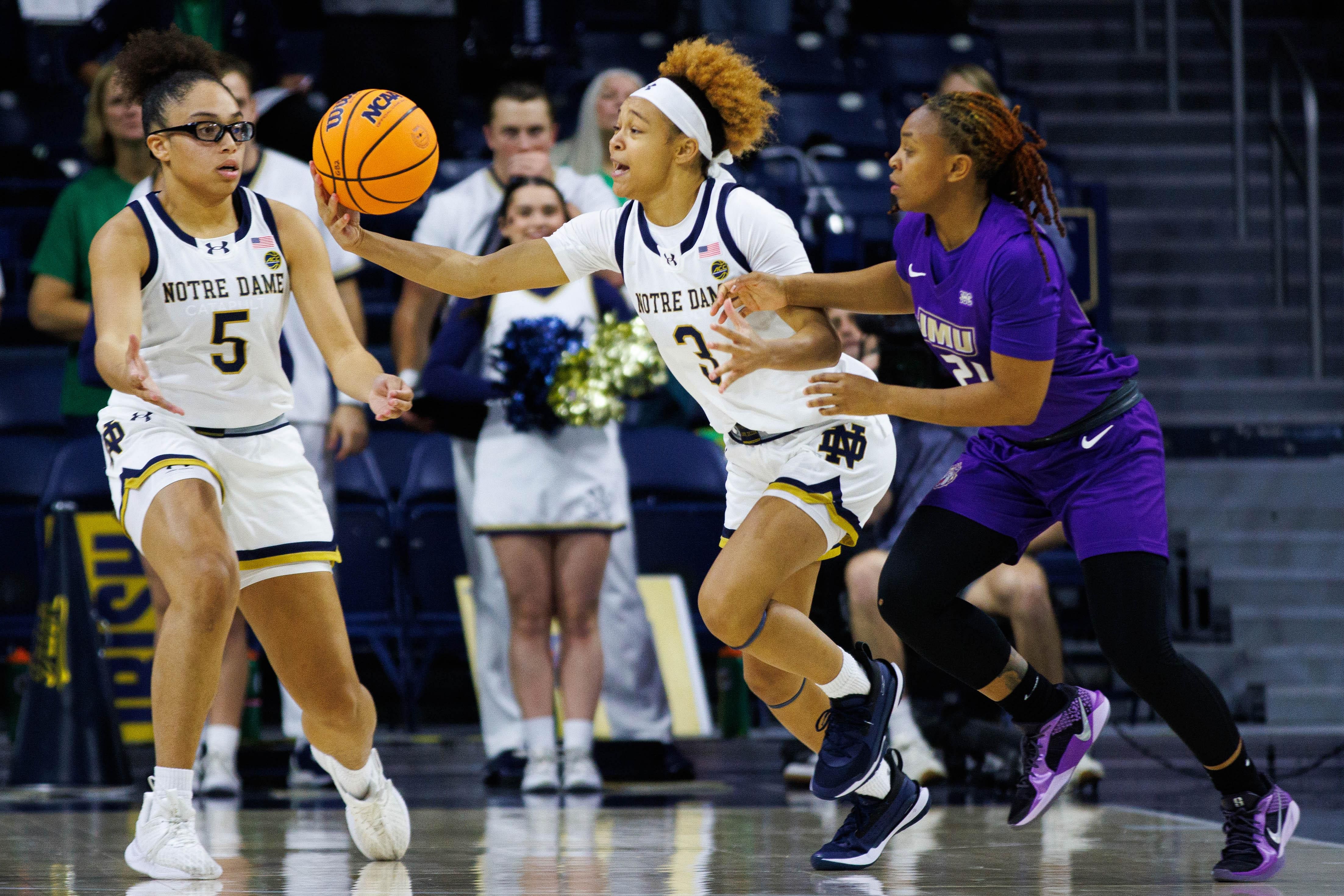 Notre Dame&#039;s Hannah Hidalgo and Olivia Miles chase after a loose ball. Photo: Imagn