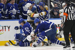 WATCH: John Tavares yanks Alexander Holtz down onto the ice as Leafs-Knights scrum breaks out