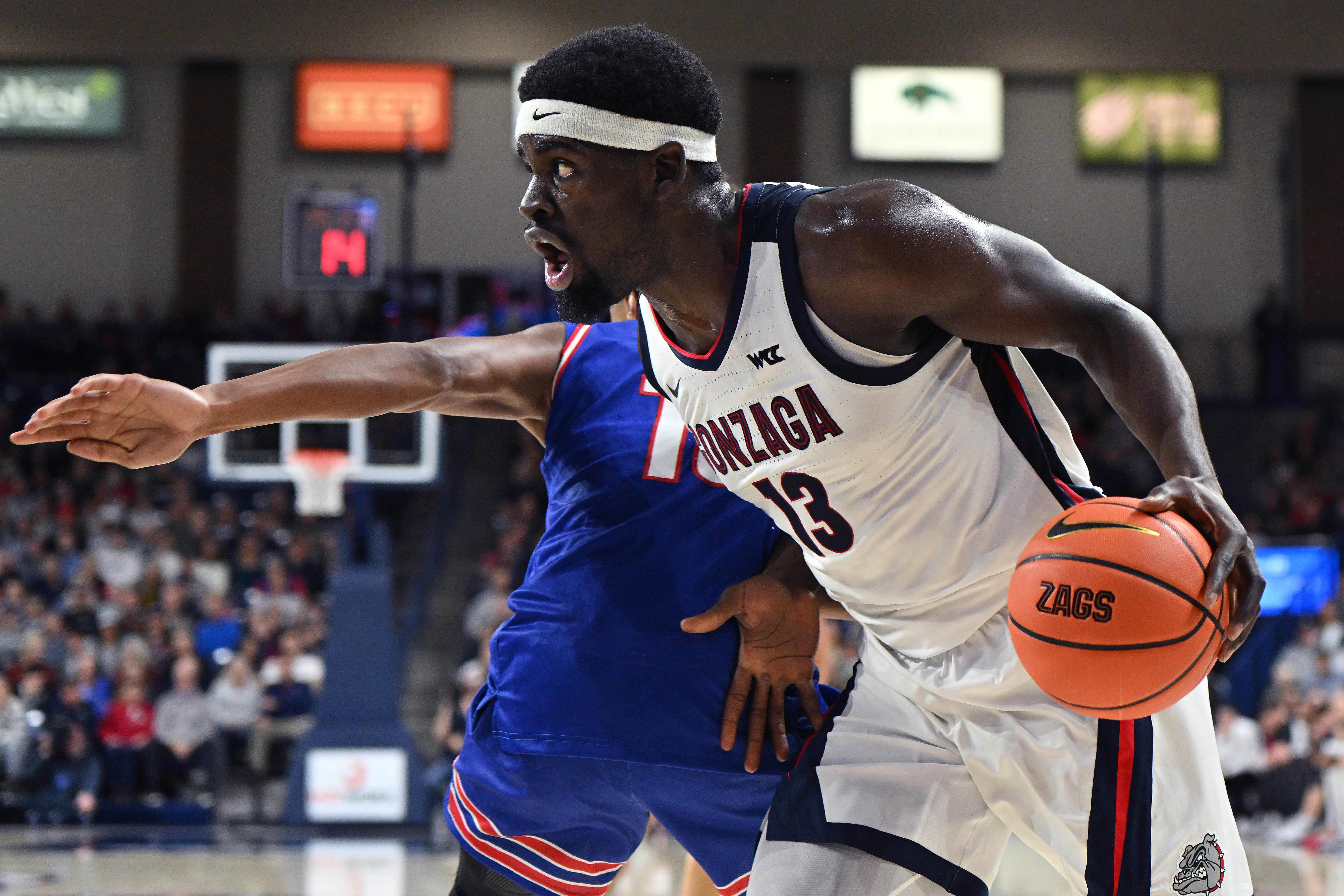 Gonzaga Bulldogs forward Graham Ike (13) gets past UMass Lowell River Hawks forward Max Brooks (10) in the first half at McCarthey Athletic Center. Photo: Imagn