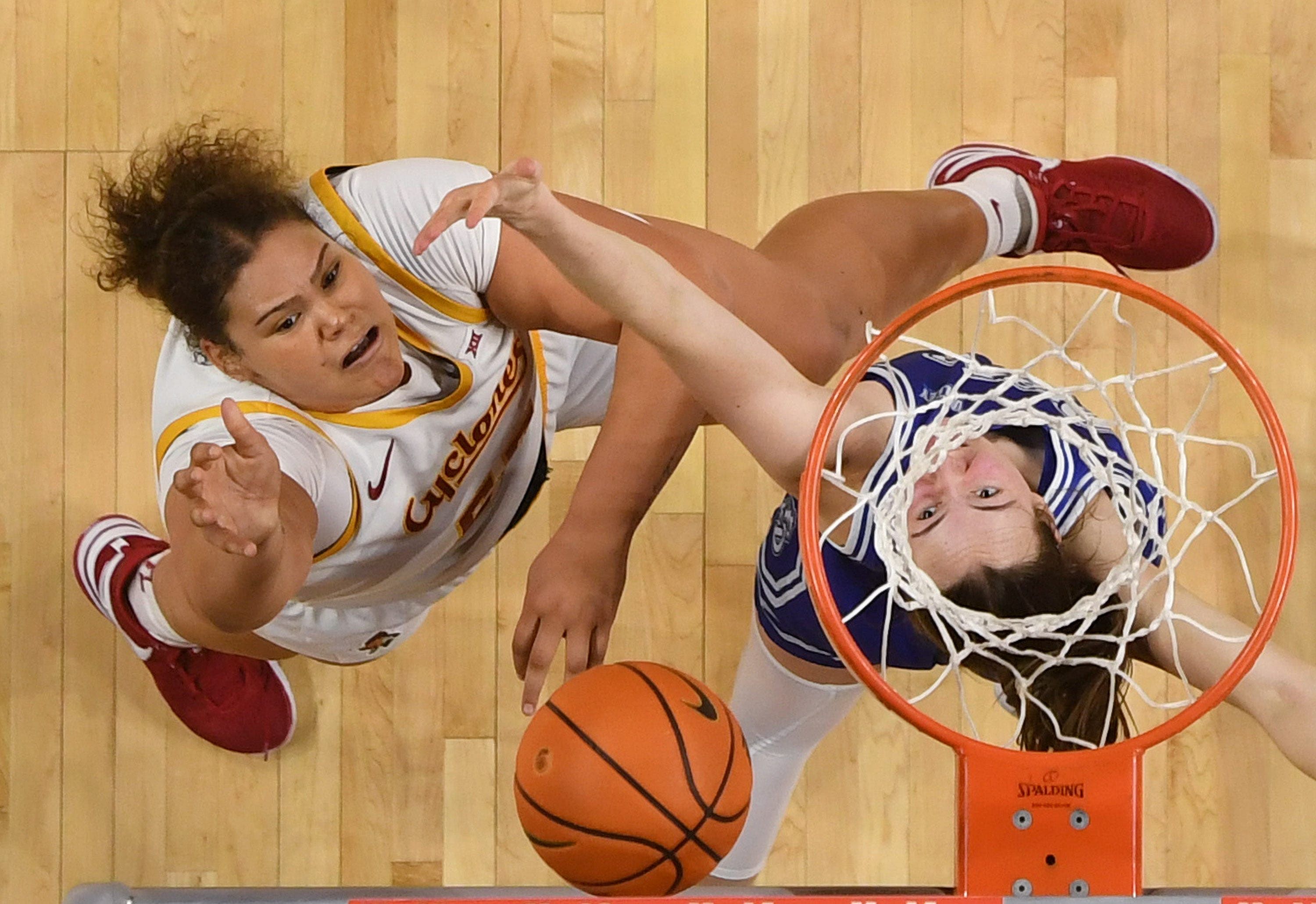 Iowa State Cyclones&#039; center Audi Crooks (55) shoots between Drake Bulldogs forward Anna Miller (14) and guard Katie Dinnebier (10) during the second quarter. Photo: Imagn