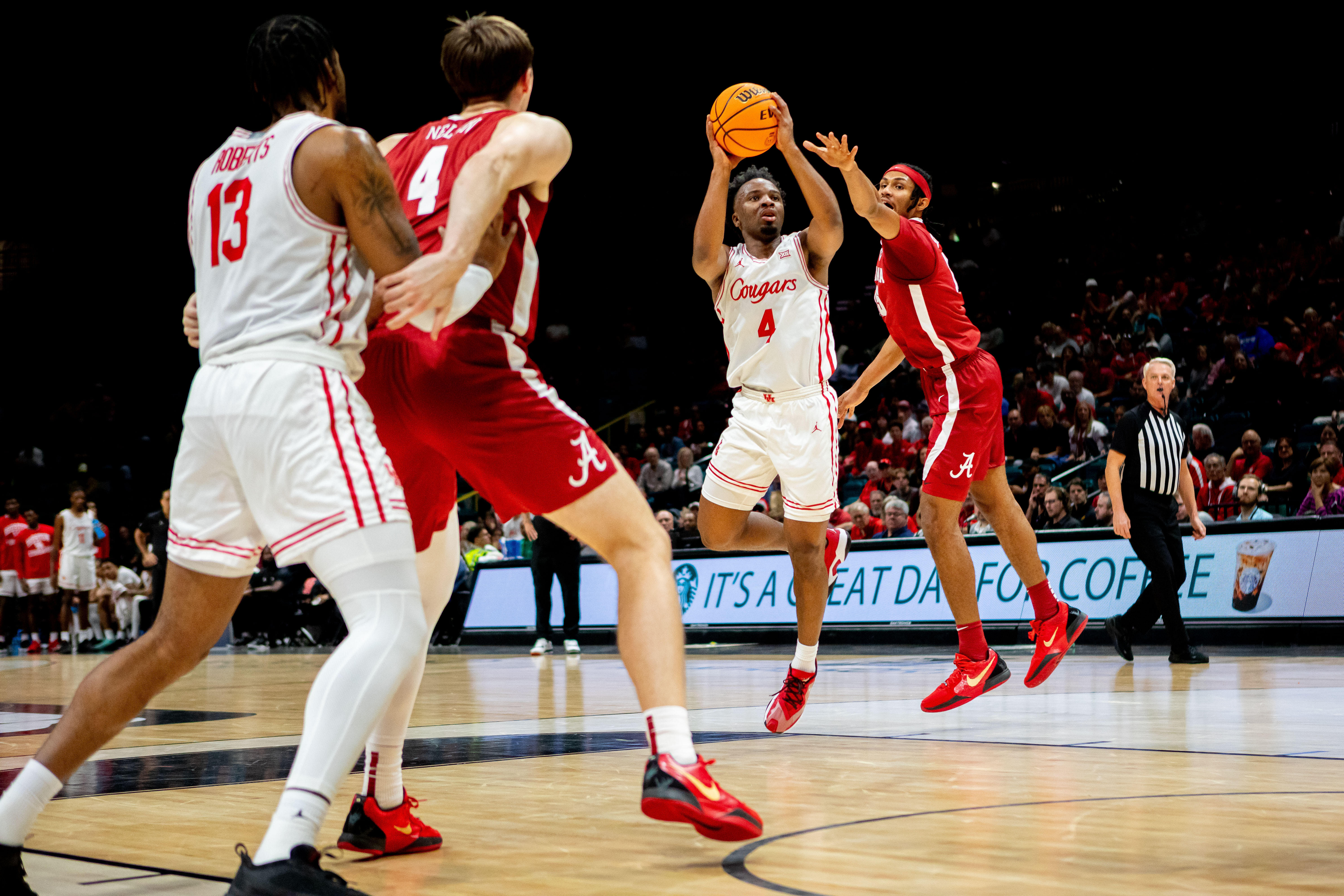 Houston Cougars guard L.J. Cryer (4) shoots the ball against the Alabama Crimson Tide during the first half at MGM Grand Garden Arena. (Image Source: IMAGN)