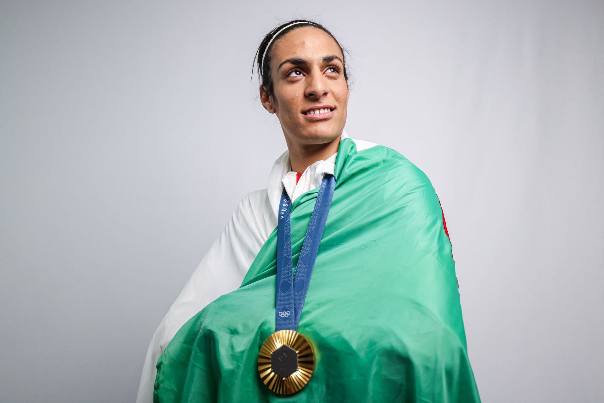 Imane Khelif posing with the Olympic gold medal at the Paris Olympics 2024 [Image Source : Getty]