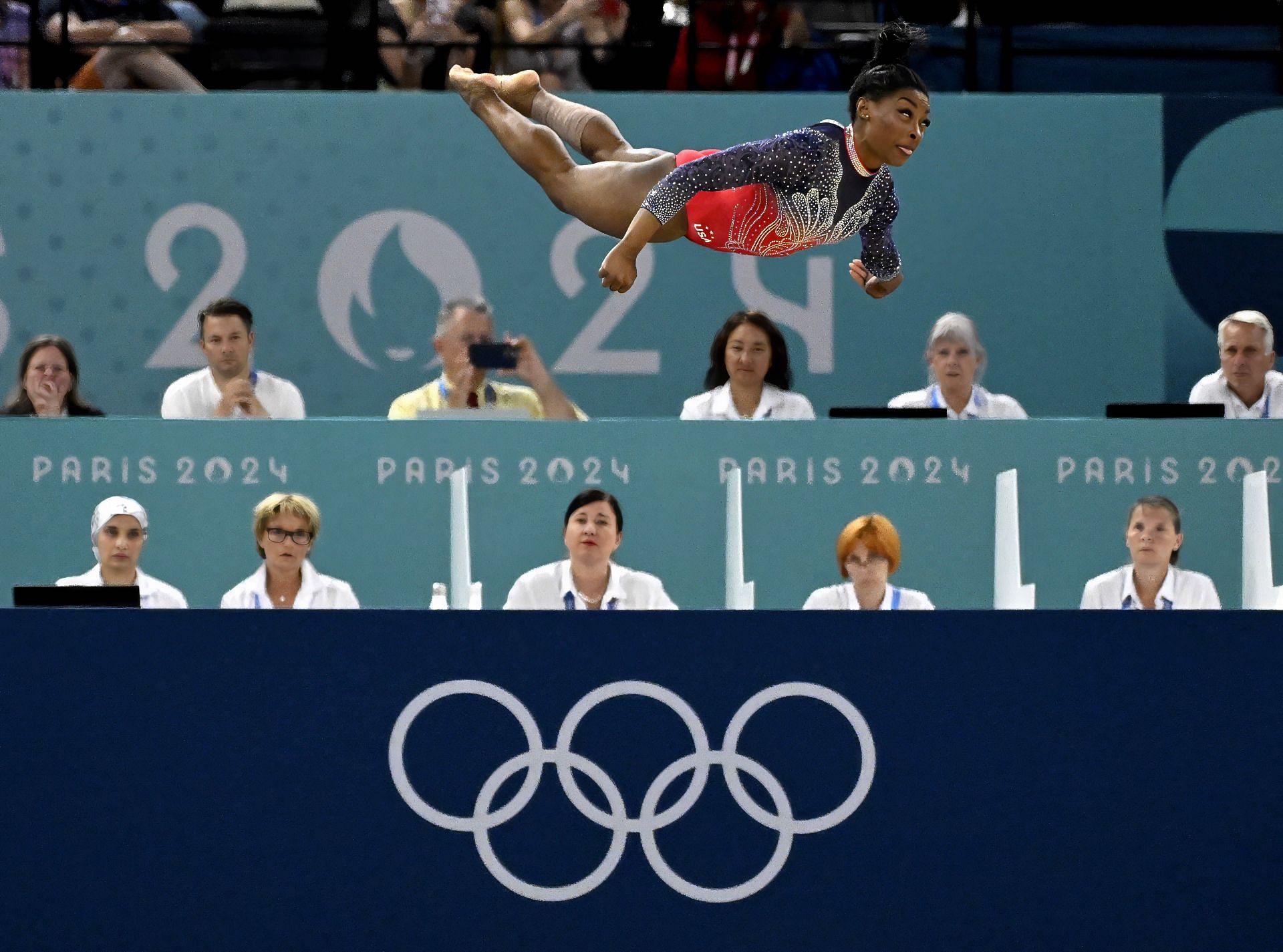 Gymnastics during the Paris 2024 Olympics. - Simone Biles airborne during her floor routine (Source: Getty)